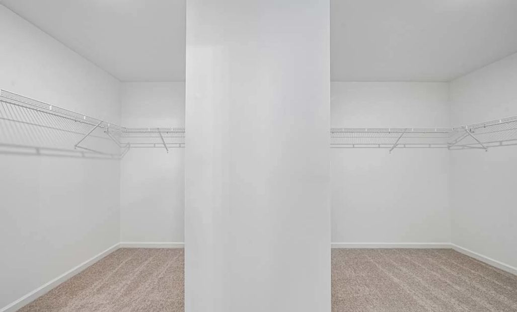 Representative Photo: Primary Bedroom Walk-In Closet
