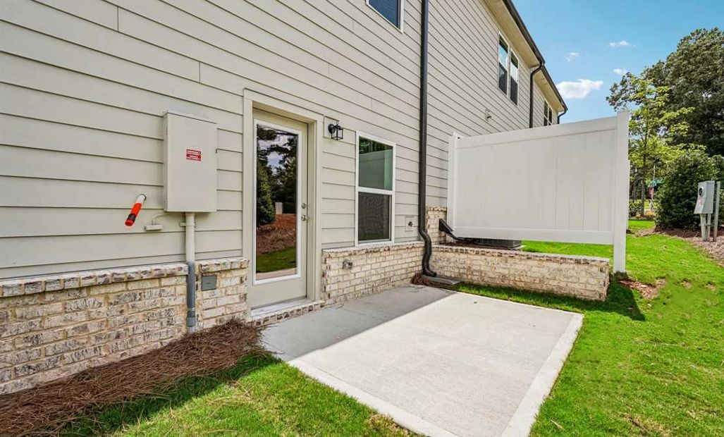 Rear Exterior with Private Patio