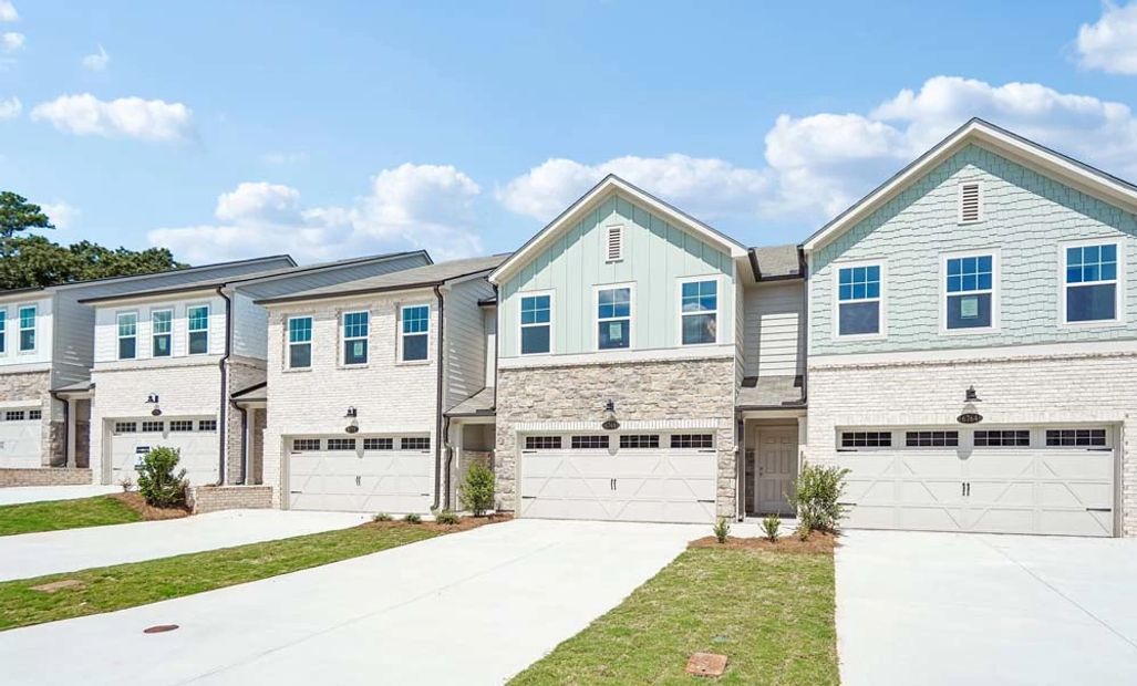 Representative Photo: Front Exterior of Townhome Building
