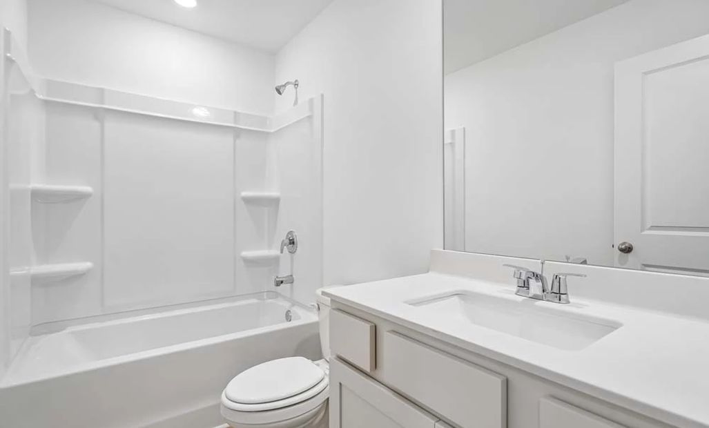 Representative Photo: Bathroom Two featuring Serene Collection Finishes