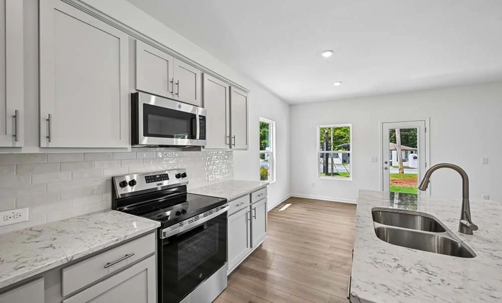 Kitchen featuring Milan Collection Finishes