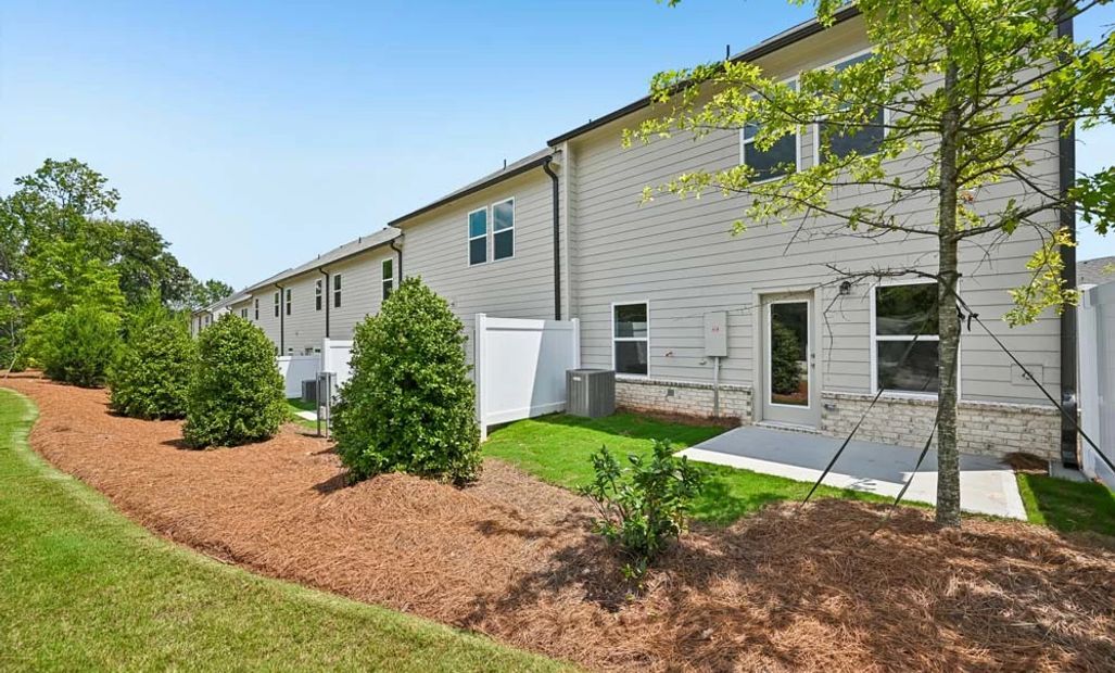 Rear Exterior with Private Patio