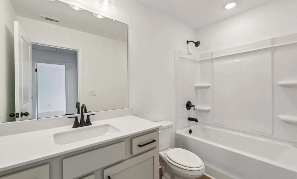 Representative Photo: Bathroom Two featuring Artisan Collection Finishes