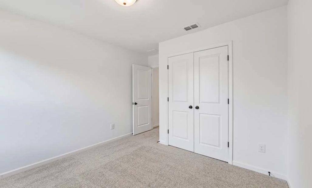 Representative Photo: Bedroom Three