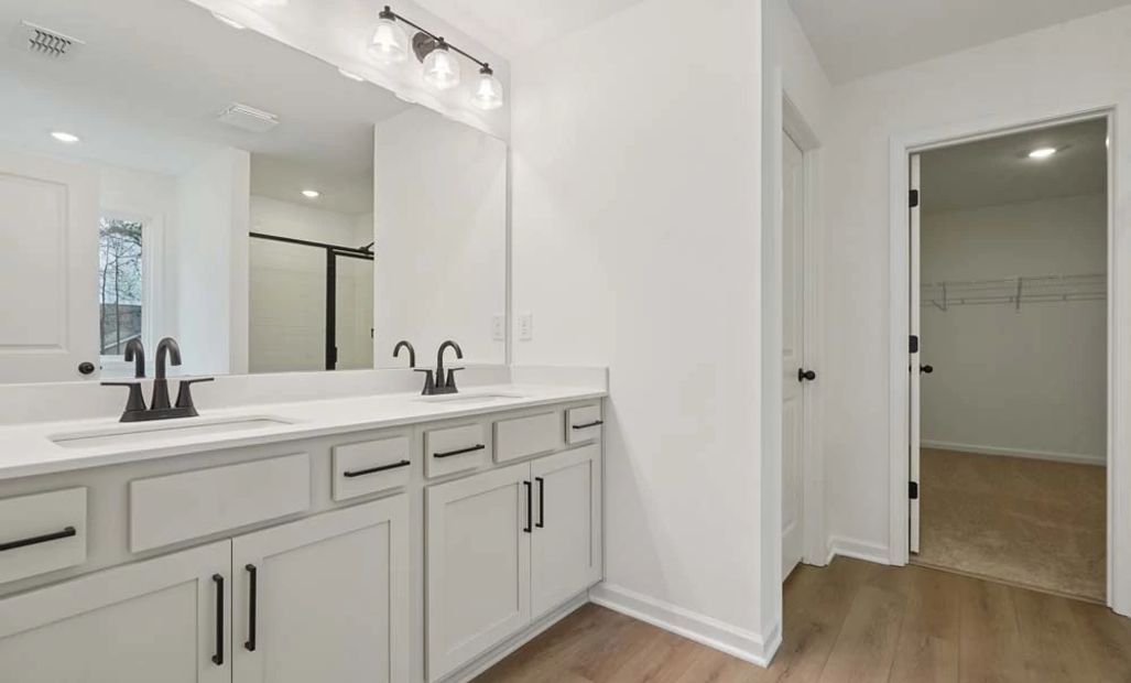 Representative Photo: Primary Bathroom featuring Artisan Collection Finishes