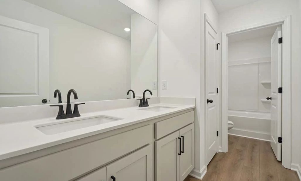 Representative Photo: Bathroom Two featuring Artisan Collection FInishes