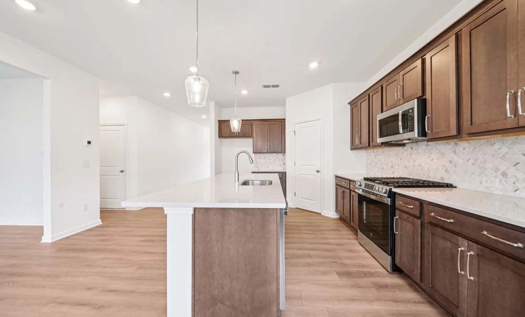 Representative Photo: Kitchen featuring Roosevelt Collection Finishes