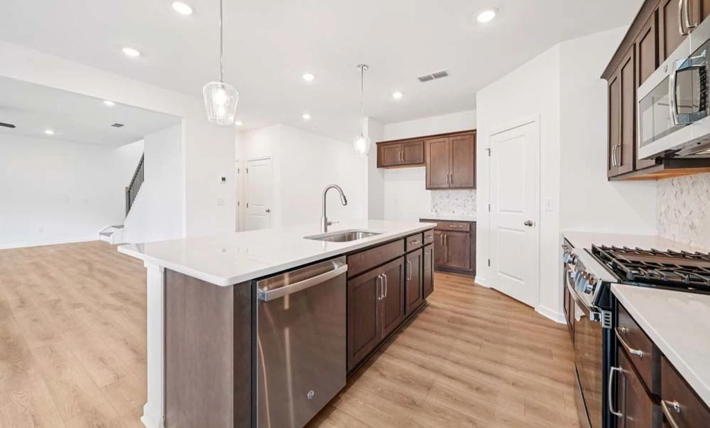 Representative Photo: Kitchen featuring Roosevelt Collection Finishes