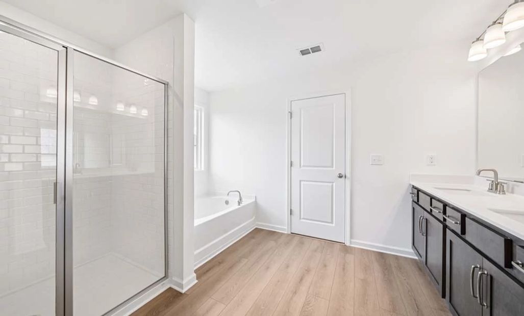 Representative Photo: Primary Bathroom featuring Roosevelt Collection Finishes