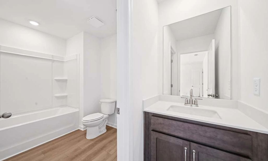 Representative Photo: Bathroom Two featuring Roosevelt Collection Finishes