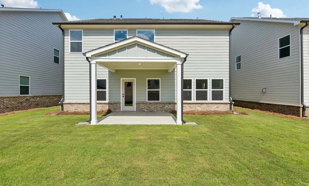 Rear Exterior with Covered Patio