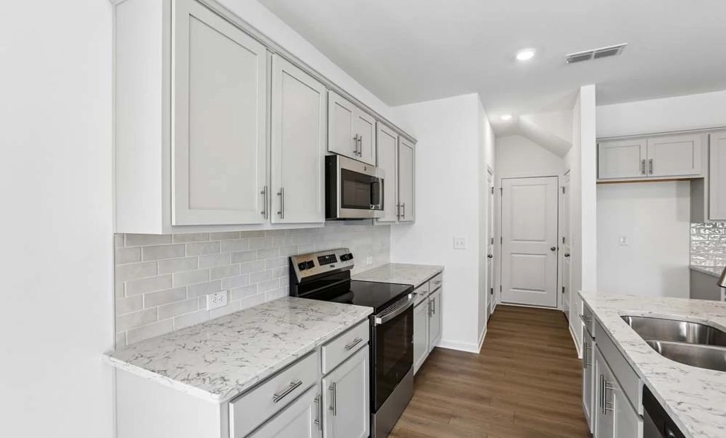 Kitchen featuring Milan Collection Finishes