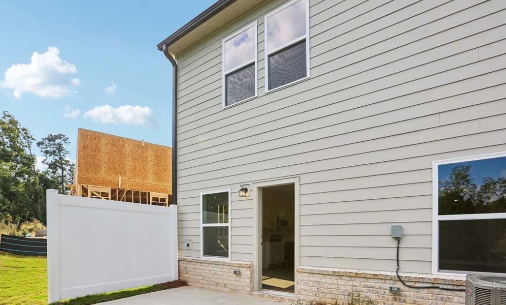 Rear Exterior with Private Patio