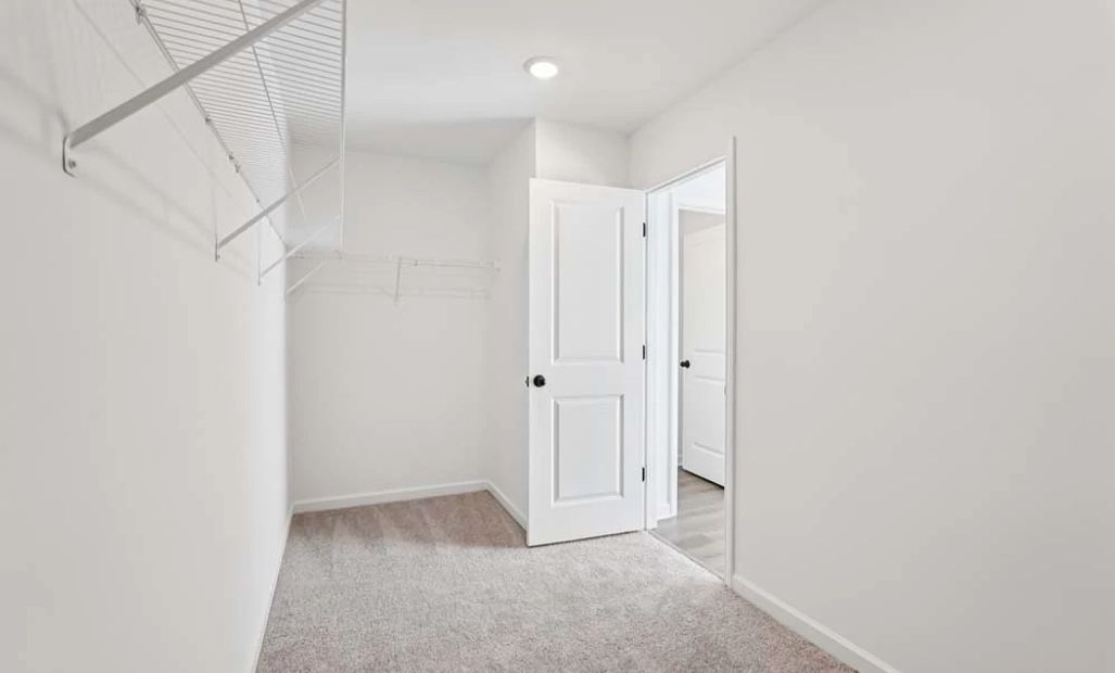 Primary Bedroom Walk-In Closet