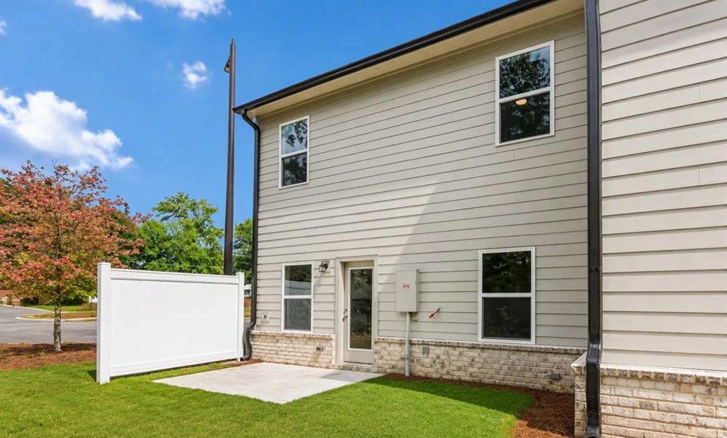 Representative Photo: Rear Exterior with Private Patio