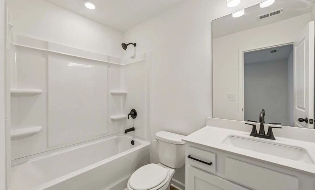 Bathroom Three featuring Harmony Collection Finishes