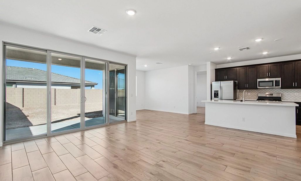 Great room, kitchen and dining. Not actual home, finishes and options may vary.