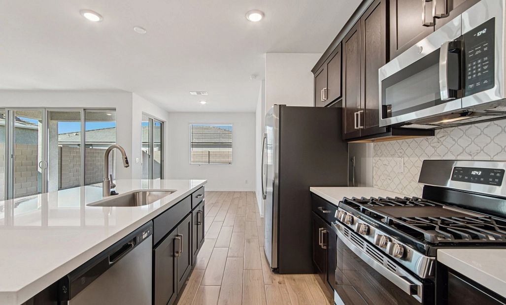 Kitchen featuring the Roosevelt Collection. Not actual home, finishes may vary by community.