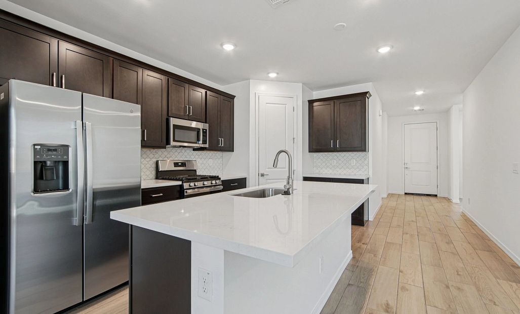 Kitchen featuring the Roosevelt Collection. Not actual home, finishes may vary by community.