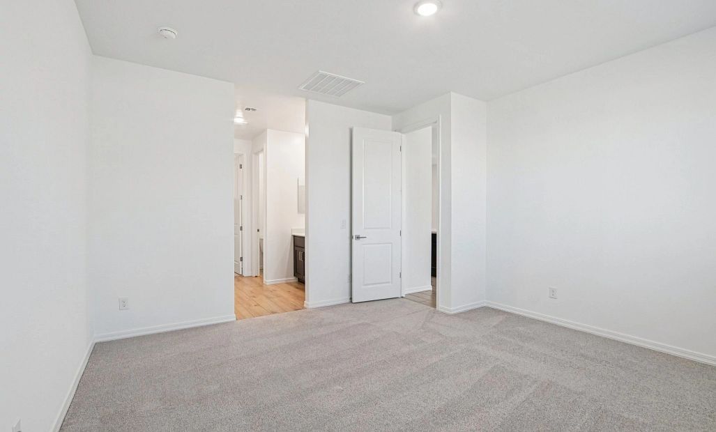 Primary suite. Not actual home, finishes and options may vary by community.