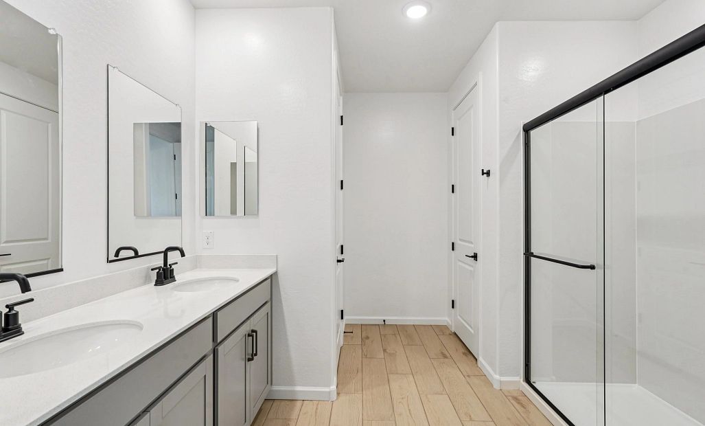 Primary bath. Not actual home, finishes may vary by community.