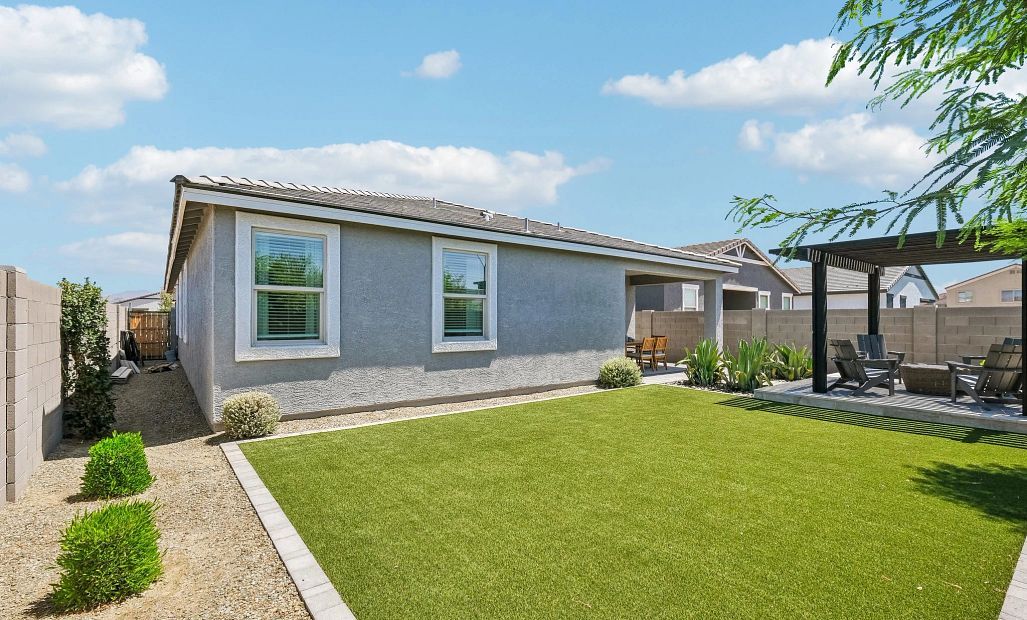 Back exterior elevation with full backyard landscaping