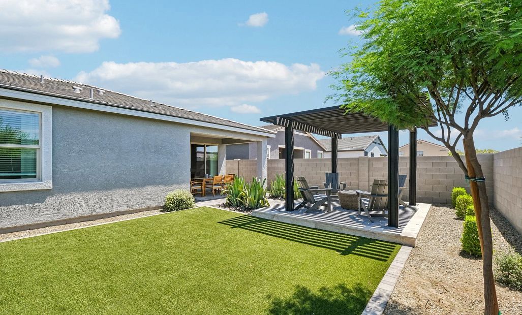 Back exterior elevation with full backyard landscaping