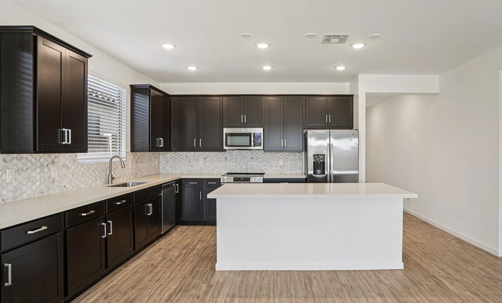 Kitchen featuring the Roosevelt Collection. Not actual home, finishes may vary by community.