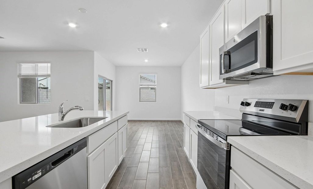 Kitchen and dining. Representative images and renderings are for illustrative purposes. Actual