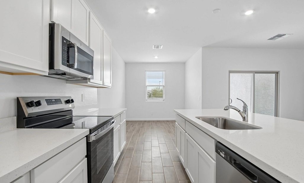 Kitchen and dining. Representative images and renderings are for illustrative purposes. Actual