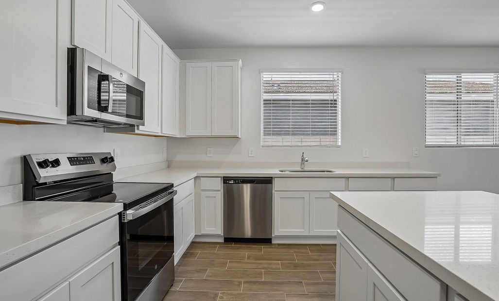 Kitchen featuring the Essentials finishes. Representative images and renderings are for illustrative
