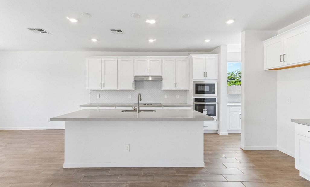 Gourmet kitchen with pass through to butler's pantry
