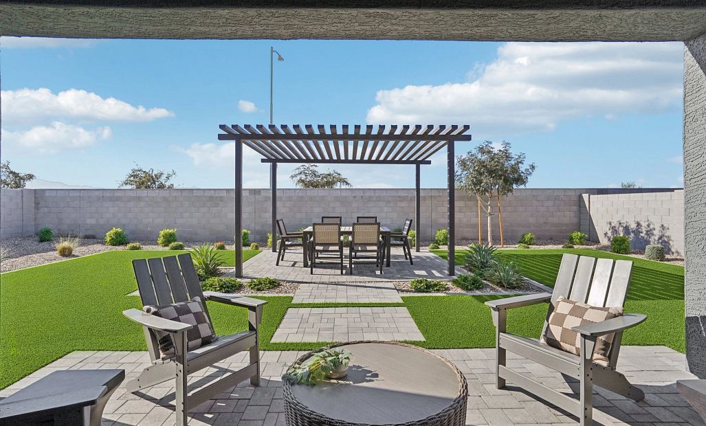 Covered patio to backyard with full landscaping