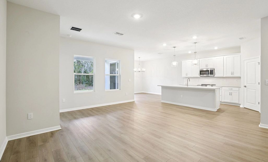 Open concept living, dining and kitchen space