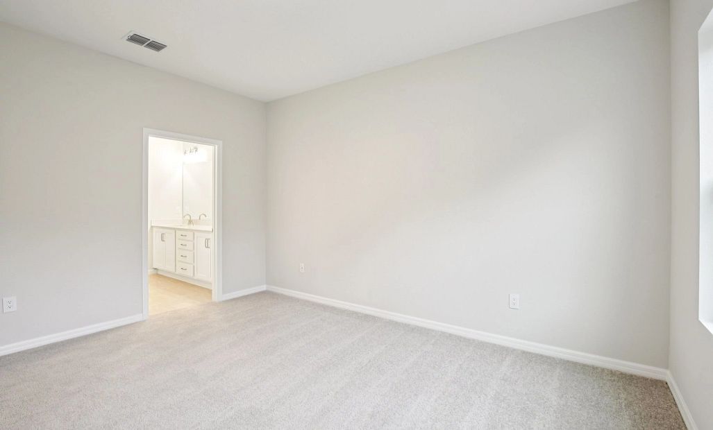 Spacious primary bedroom