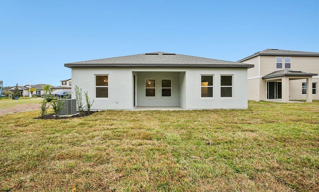 Covered lanai and spacious backyard