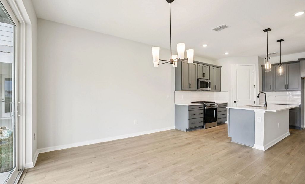 Dining space right off the kitchen ideal for entertaining