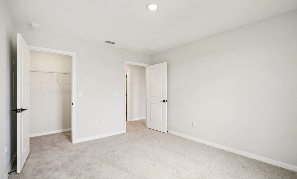 Spacious bedroom 4 with a generous closet