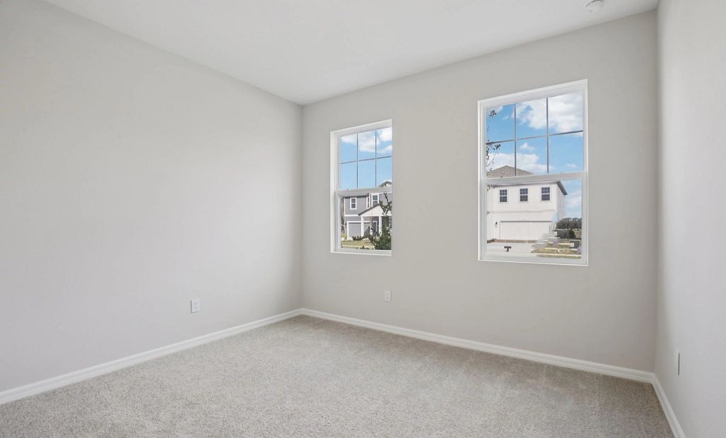 Guest bedroom located off the front of the home