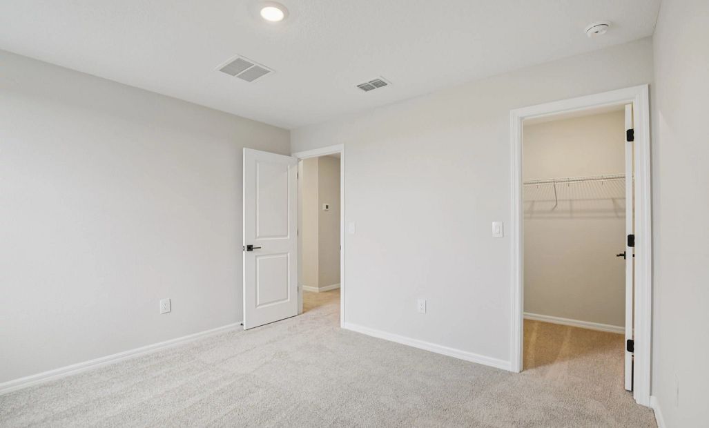 Bedroom 2 with a large walk-in closet