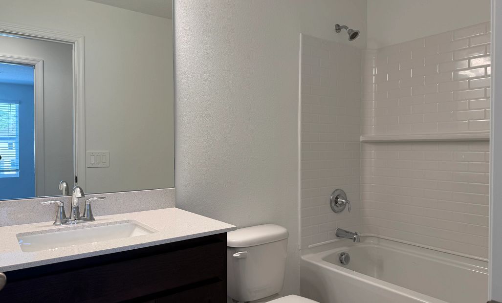 Elegant bathroom 2 with tub and shower combo