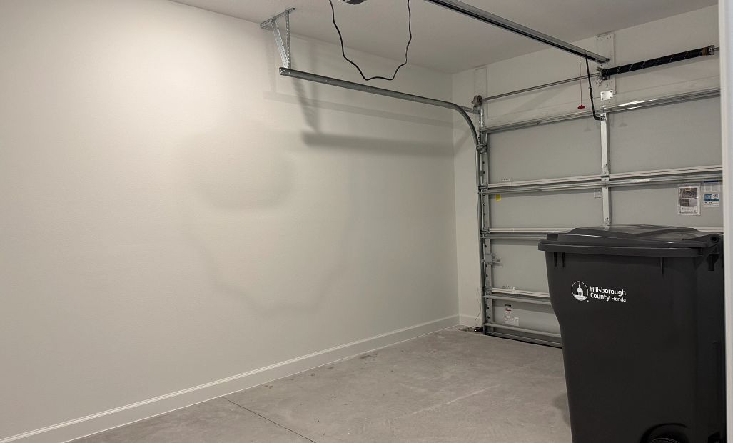 Surf plan features a 1-car garage