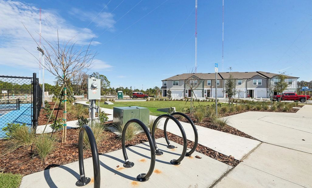 Enjoy a bike ride or casual stroll through the picturesque townhome community