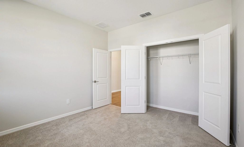 Spacious bedroom 3 with a two door closet