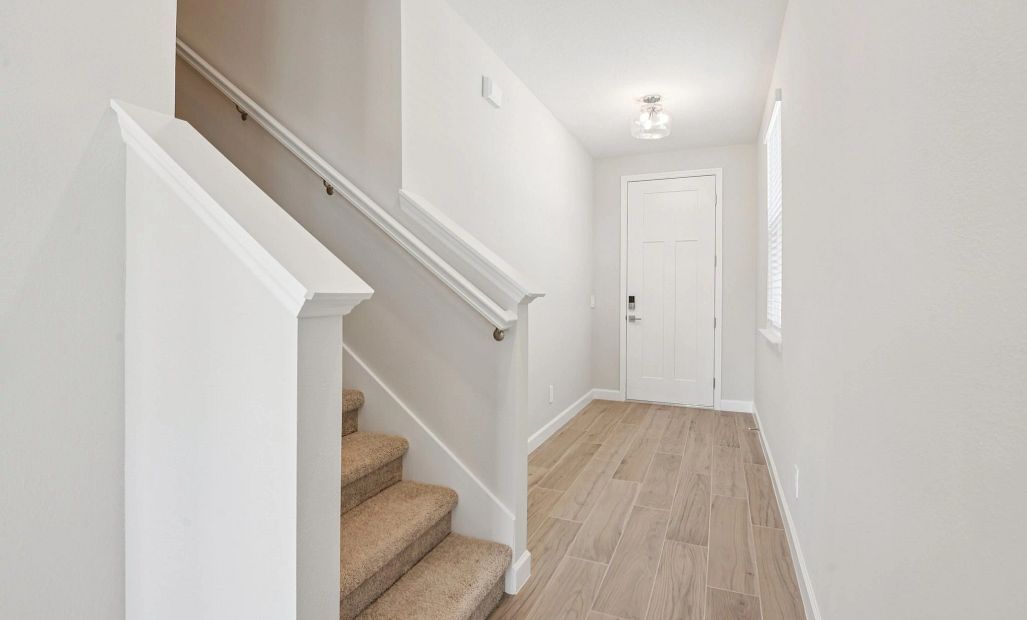 Back toward the foyer you will take the stairs to the bedrooms