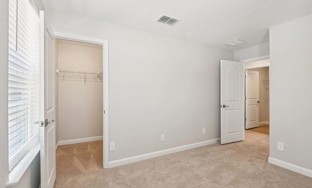 Spacious walk-in closet off bedroom 2