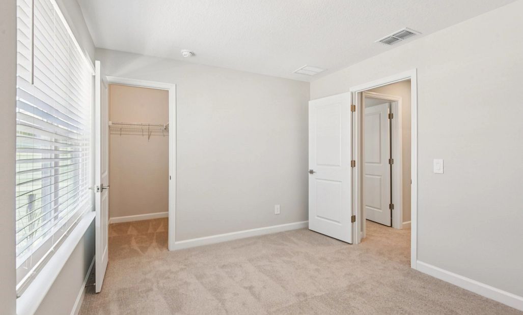 Bedroom 3 has a spacious walk-in closet