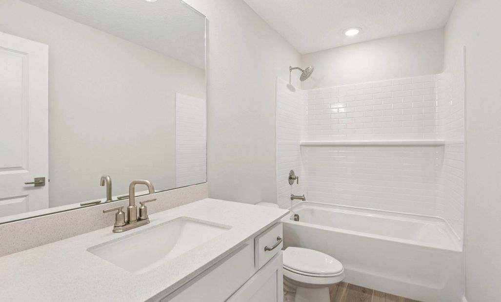 Bathroom 2 shared by all secondary bedrooms featuring aspects of AW Collection® Timeless