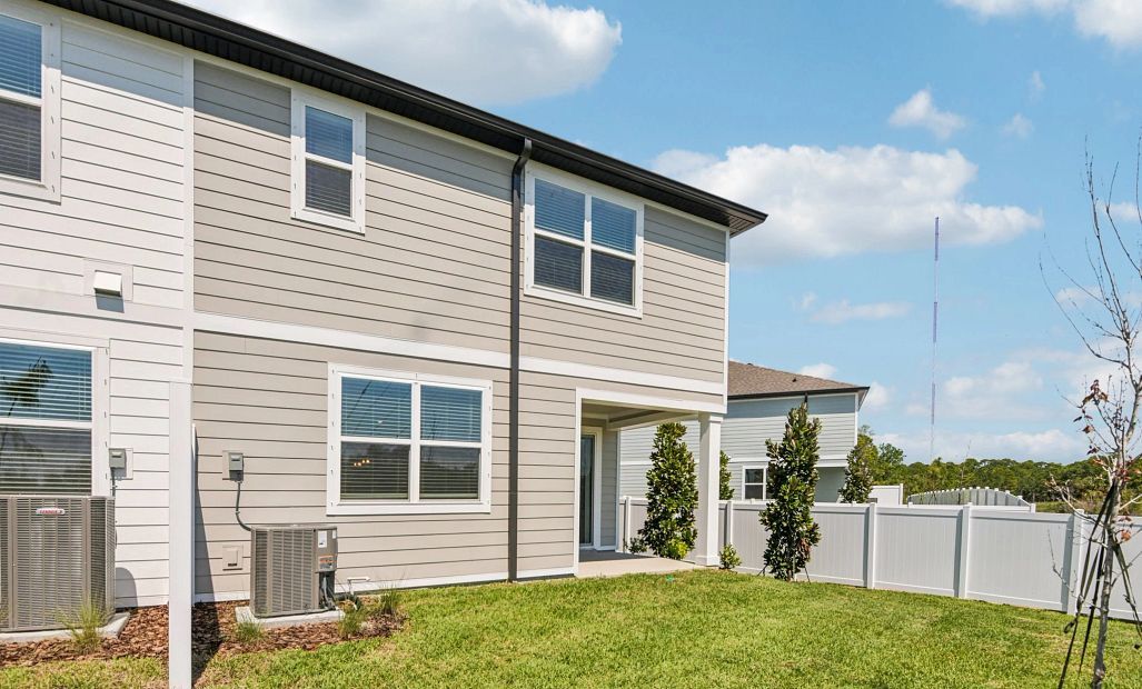 Spacious backyard with privacy fence on the side