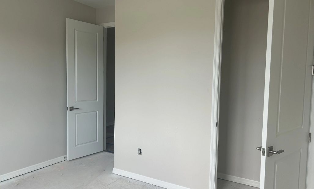 Bedroom 2 located off the foyer as you enter the home - under construction